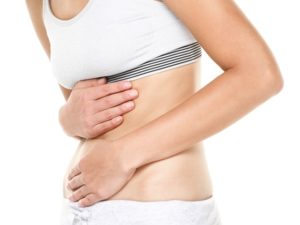 Stomach pain - woman having abdominal pain
